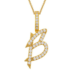 Collar con colgante inicial de moissanita en plata de ley bañada en oro