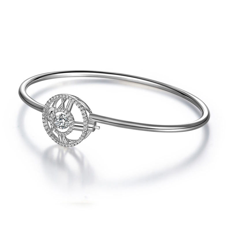 Pulsera brazalete con piedra danzante y reloj con números romanos