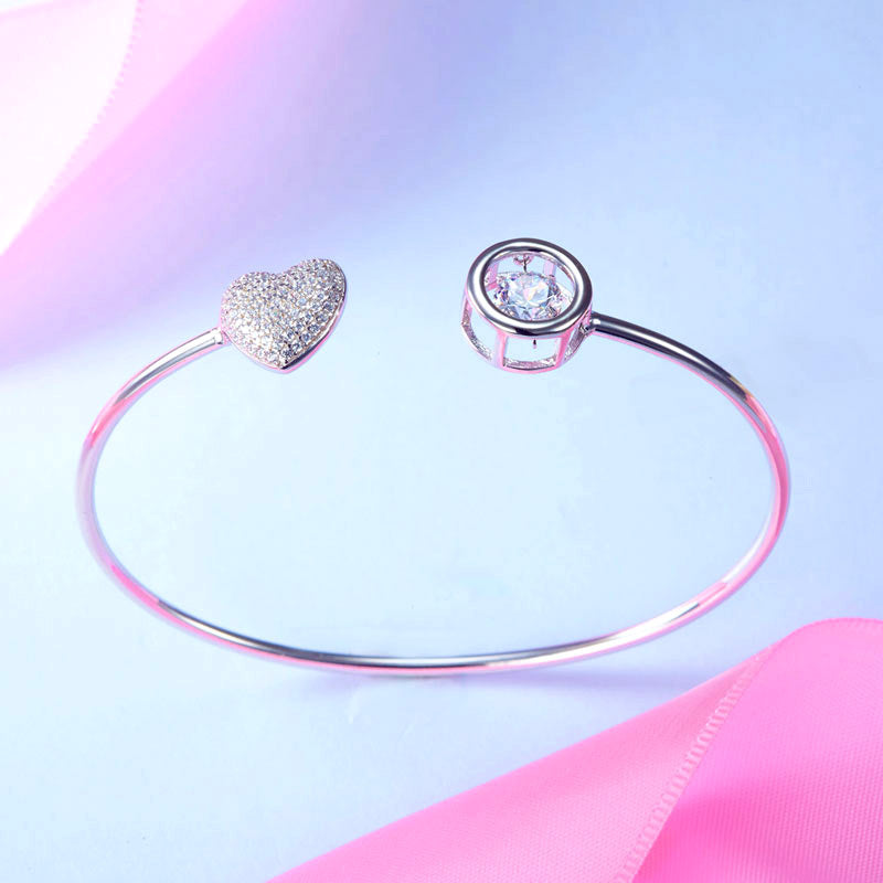 Pulsera con corazón pavé y piedras danzantes