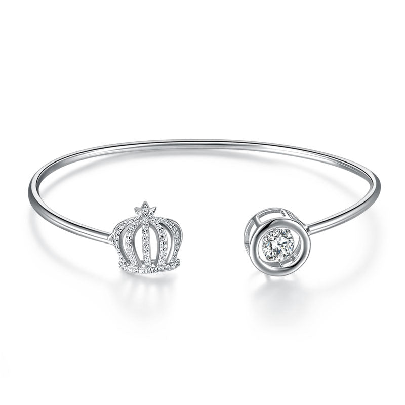 Brazalete de plata de ley con piedra danzante y corona