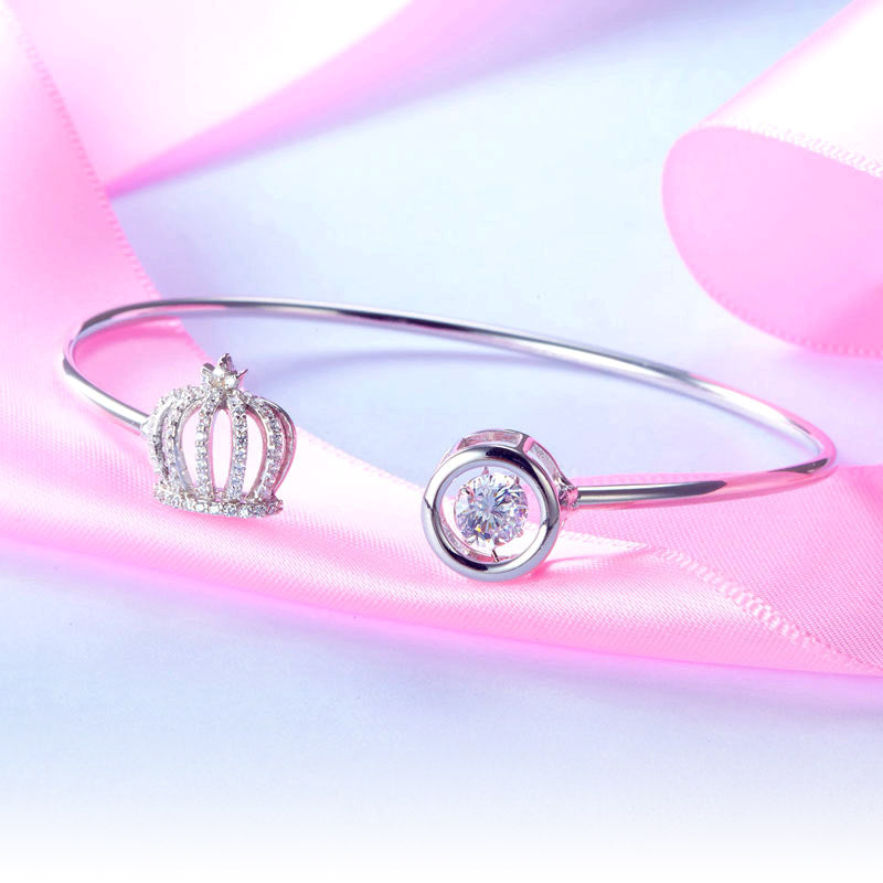 Brazalete de plata de ley con piedra danzante y corona