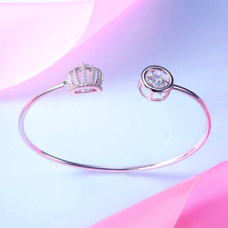 Brazalete de plata de ley con piedra danzante y corona