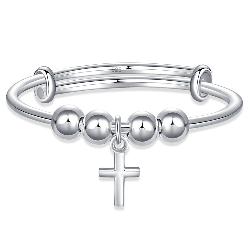 Pulsera ajustable con cruz en plata de ley para niñas