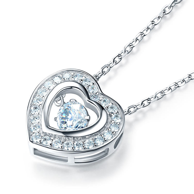 Collar con colgante de piedra danzante en forma de corazón