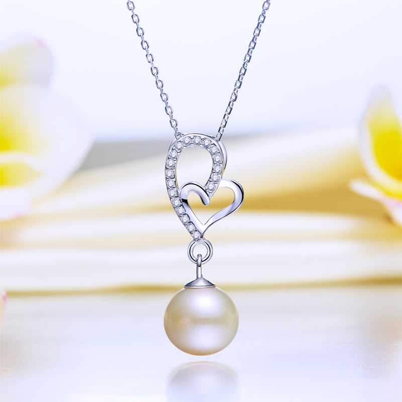 Collier avec pendentif en forme de cœur et perles d'eau douce en argent sterling