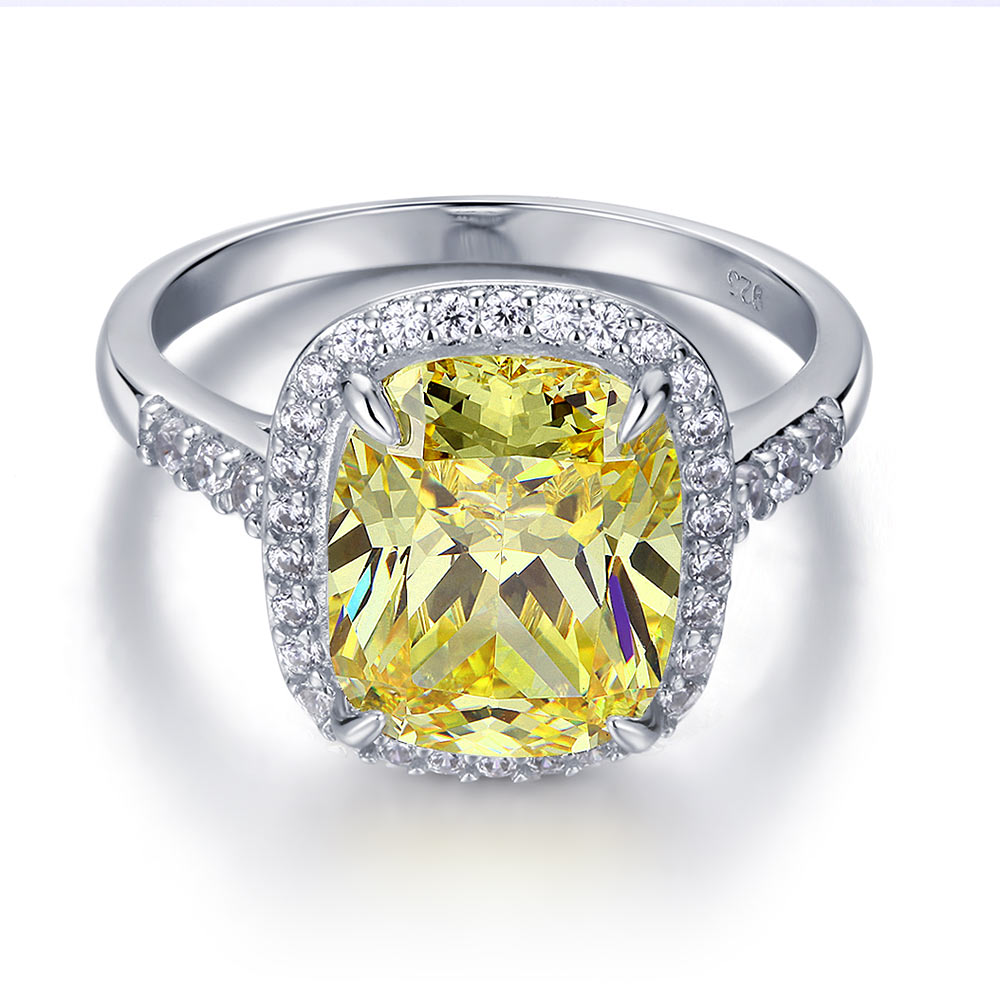 Anillo de plata de ley con halo de diamantes simulados amarillos de talla cojín de 6 quilates
