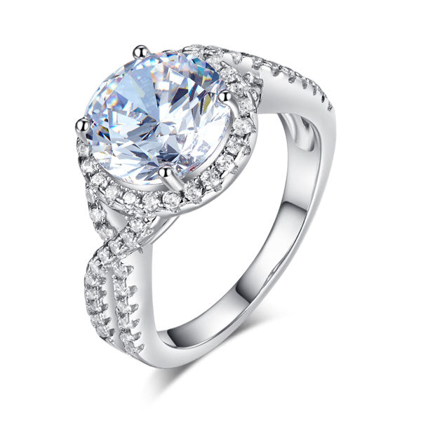 Anillo de 3 quilates con diamante simulado de talla brillante redonda y cuerpo retorcido en plata de ley.