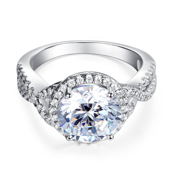 Anillo de 3 quilates con diamante simulado de talla brillante redonda y cuerpo retorcido en plata de ley.