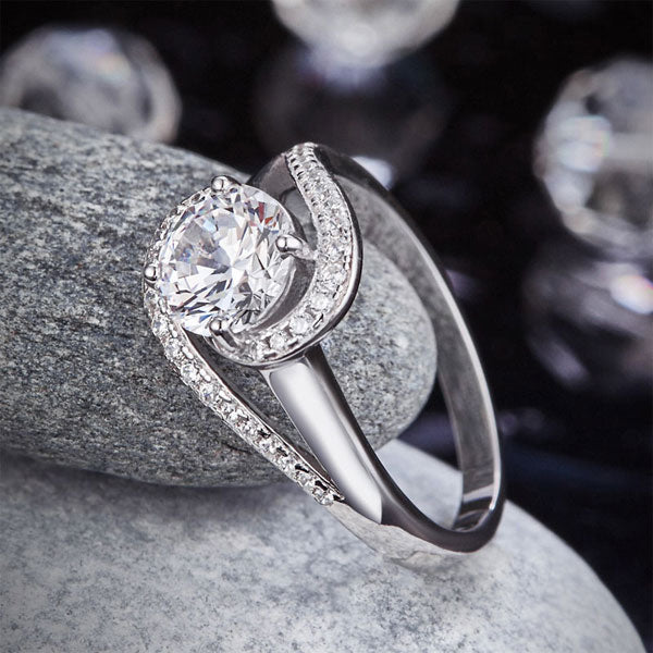 1.25 CT. Round Simulated Diamond Twist Curl Ring in Sterling Silver