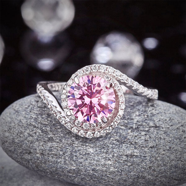 Anillo de plata de ley con diamante simulado rosa redondo de 2,5 quilates y rizo retorcido.