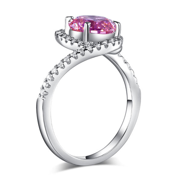 Anillo de plata de ley con diamante simulado rosa redondo de 2,5 quilates y rizo retorcido.