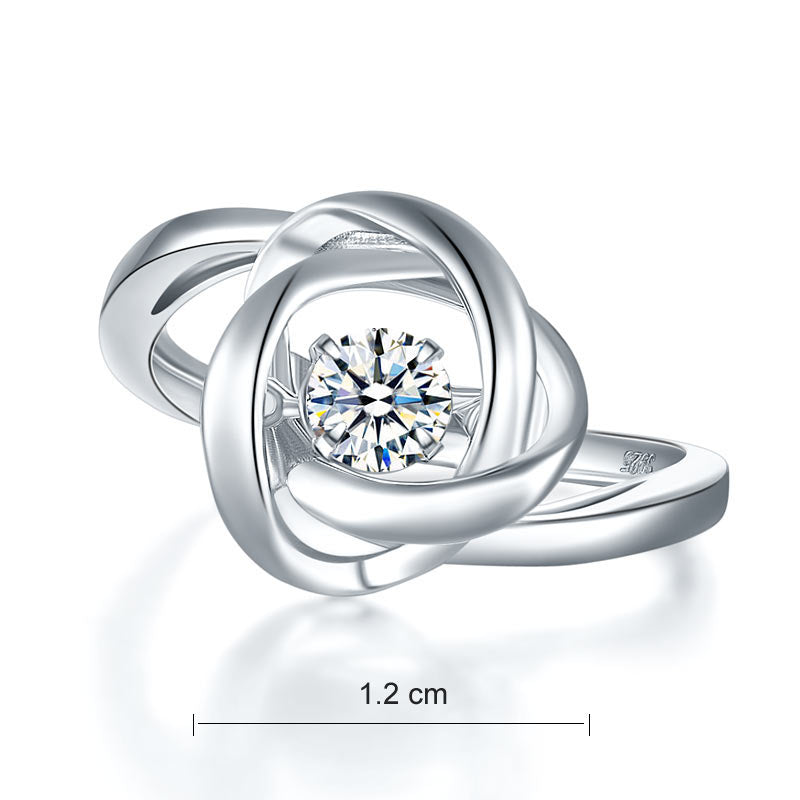 Anillo de piedra danzante con nudo de amor