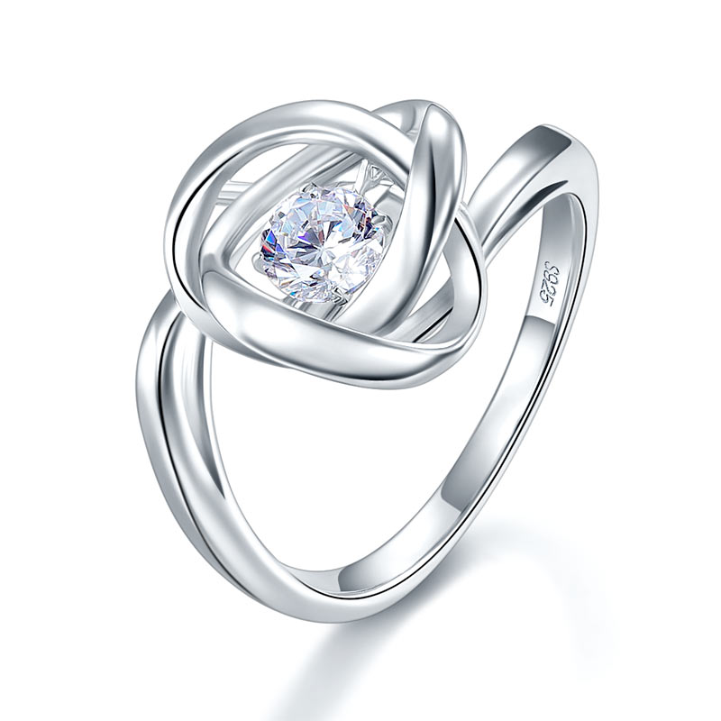 Anillo de piedra danzante con nudo de amor