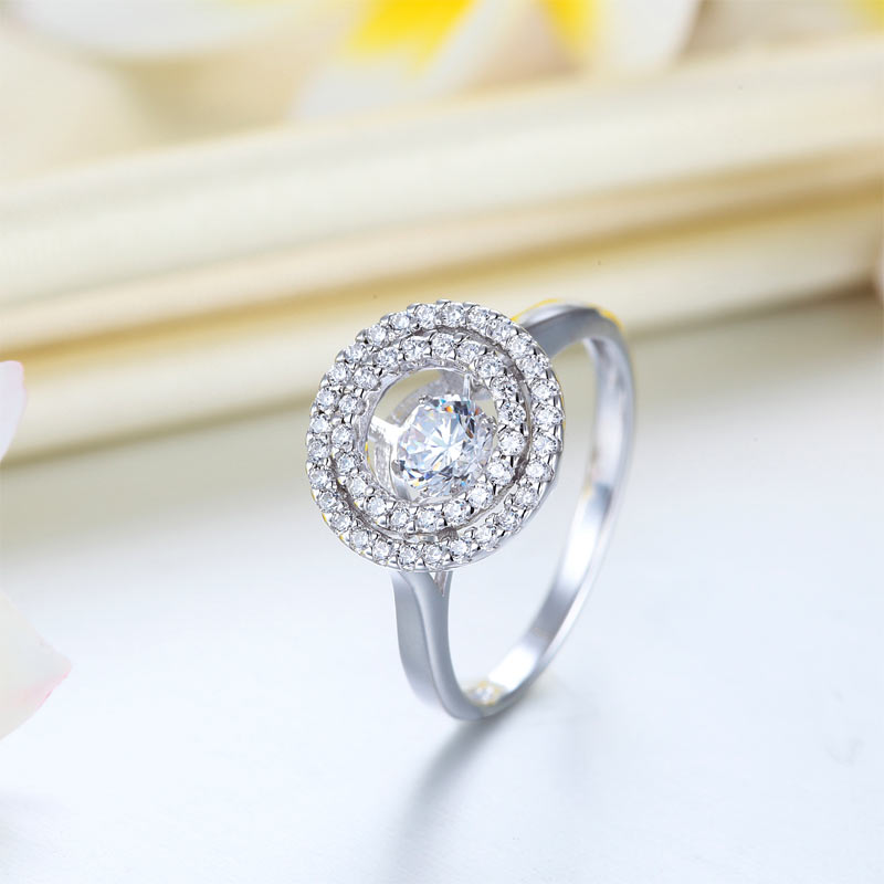 Anillo de piedra danzante con doble halo