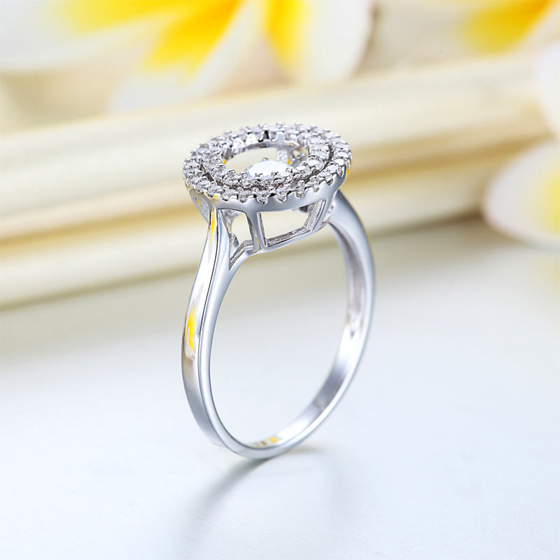 Anillo de piedra danzante con doble halo