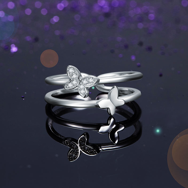 Anillo de puño de doble banda con mariposa en plata de ley