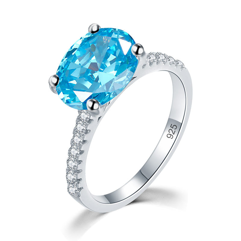Anillo de diamantes simulados azul aguamarina de talla ovalada de 4 quilates en plata de ley