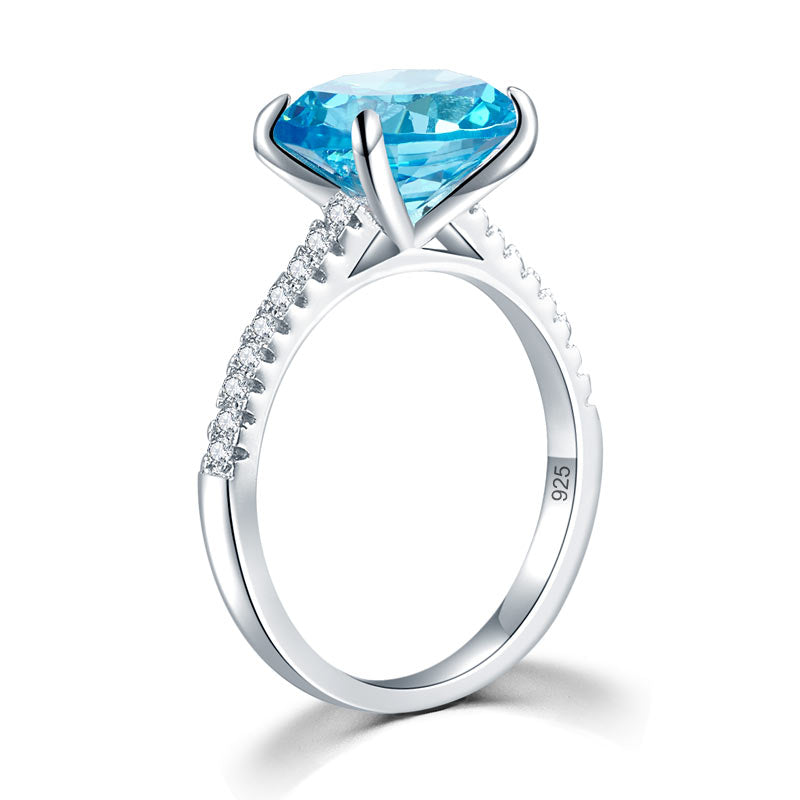 Anillo de diamantes simulados azul aguamarina de talla ovalada de 4 quilates en plata de ley