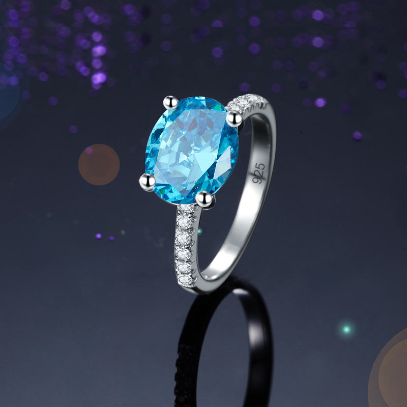 Anillo de diamantes simulados azul aguamarina de talla ovalada de 4 quilates en plata de ley