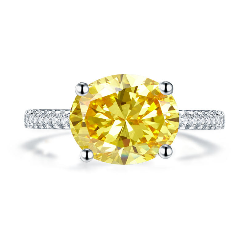 Anillo de plata de ley con diamante amarillo simulado de talla ovalada de 4 quilates