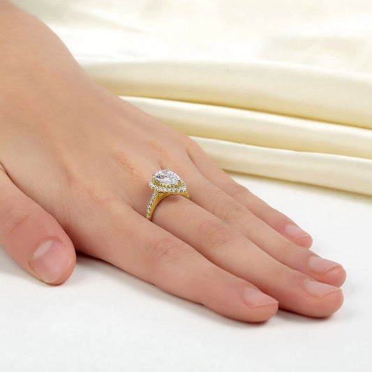 2 CT. Pear Cut Simulated Diamond Halo Ring in Yellow Gold Plated Sterling Silver