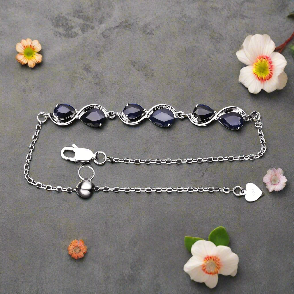 GRACE Pear Cut Twist Style Bracelet in Sterling Silver