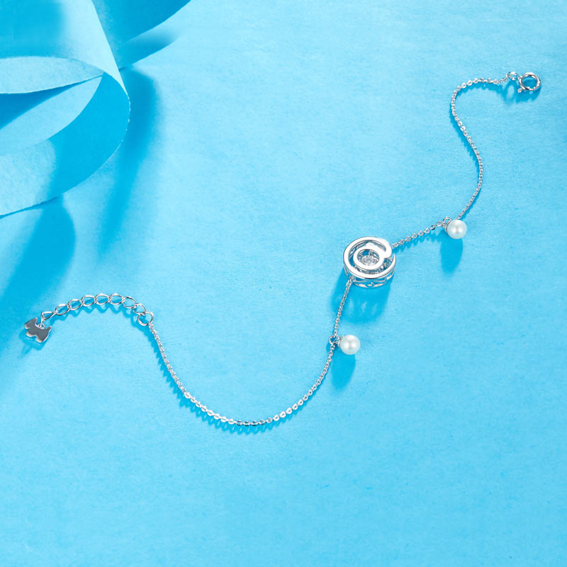 0.1 CT. Moissanite Diamond Dancing Stone with Freshwater Pearls @ Bracelet