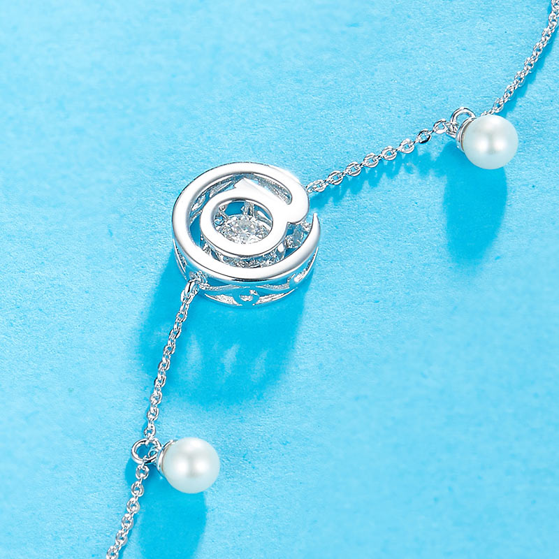 0.1 CT. Moissanite Diamond Dancing Stone with Freshwater Pearls @ Bracelet