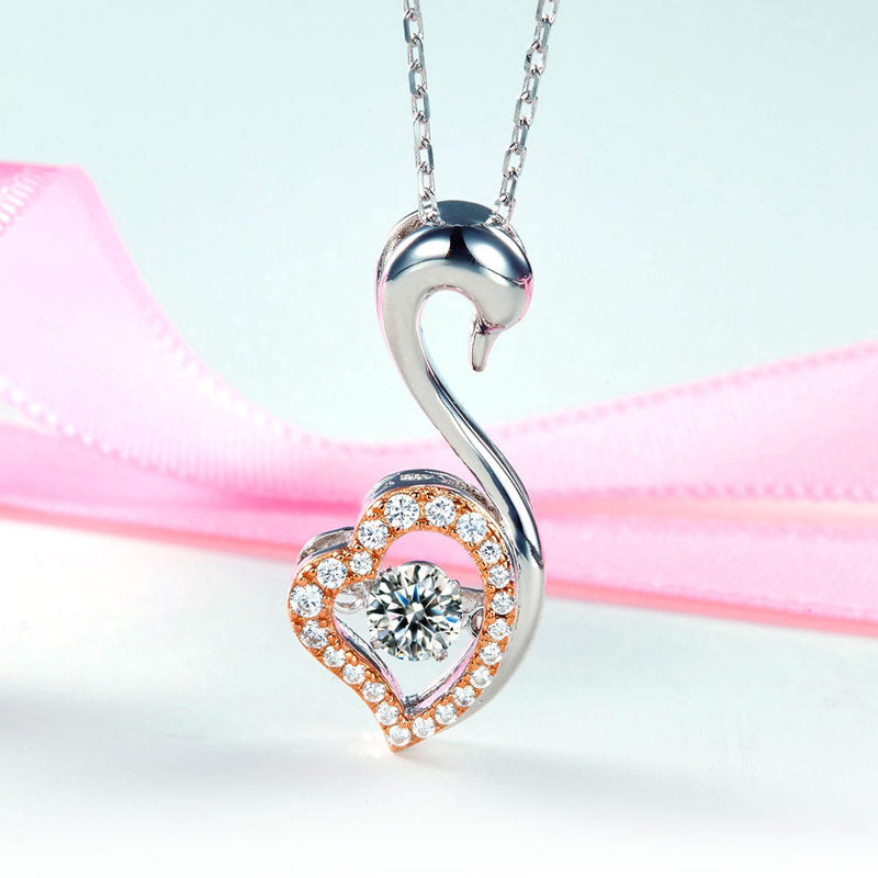 Collier avec pendentif en forme de cœur de cygne et pierre dansante