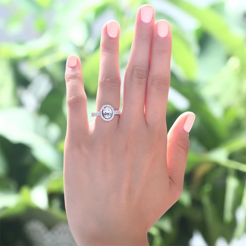 1.5 CT. Oval Cut Simulated Diamond Halo Ring in Sterling Silver