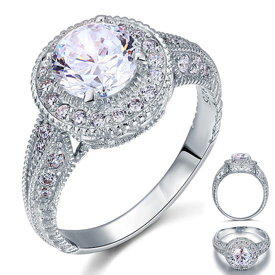 Anillo de halo vintage con diamantes redondos simulados de 2 quilates en plata de ley
