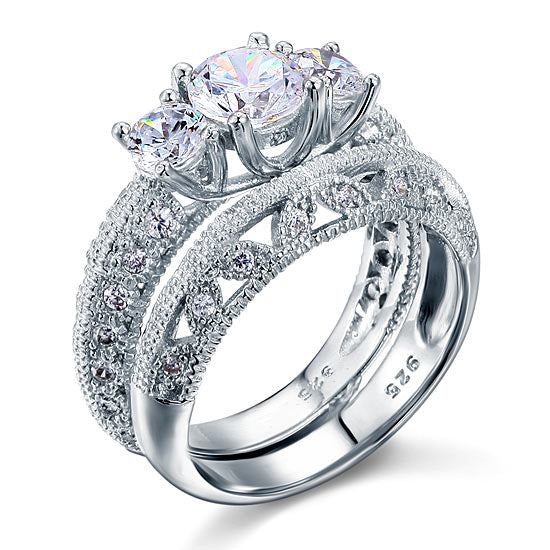 Conjunto nupcial de tres piedras de estilo vintage con diamantes simulados de 1,5 quilates en plata de ley.