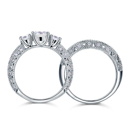 Conjunto nupcial de tres piedras de estilo vintage con diamantes simulados de 1,5 quilates en plata de ley.