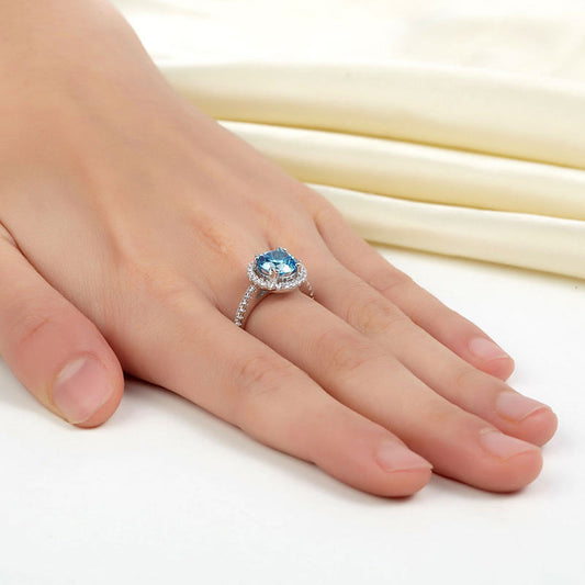 2 CT. Round Aqua Blue Simulated Diamond Halo Ring in Sterling Silver