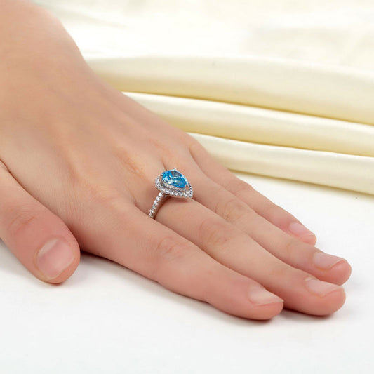 2 CT. Pear Cut Aqua Blue Simulated Diamond Halo Ring in Sterling Silver