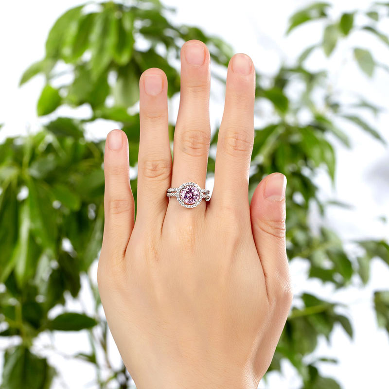 Conjunto nupcial de 2 quilates con halo redondo de diamantes simulados rosas en plata de ley