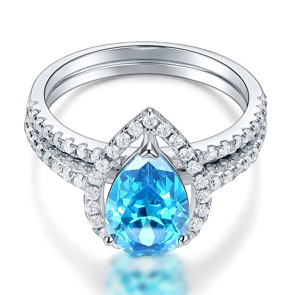 2 CT. Pear Cut Aqua Blue Simulated Diamond Halo Bridal Set in Sterling Silver