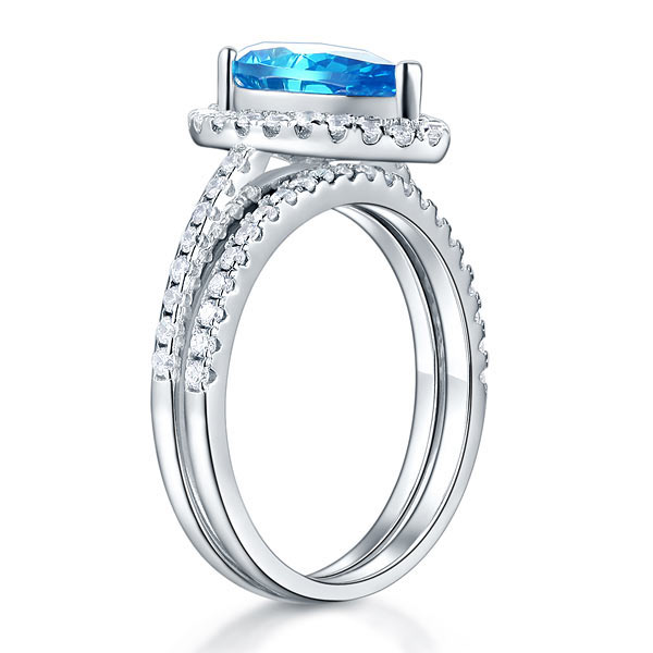 2 CT. Pear Cut Aqua Blue Simulated Diamond Halo Bridal Set in Sterling Silver
