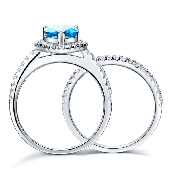 2 CT. Pear Cut Aqua Blue Simulated Diamond Halo Bridal Set in Sterling Silver