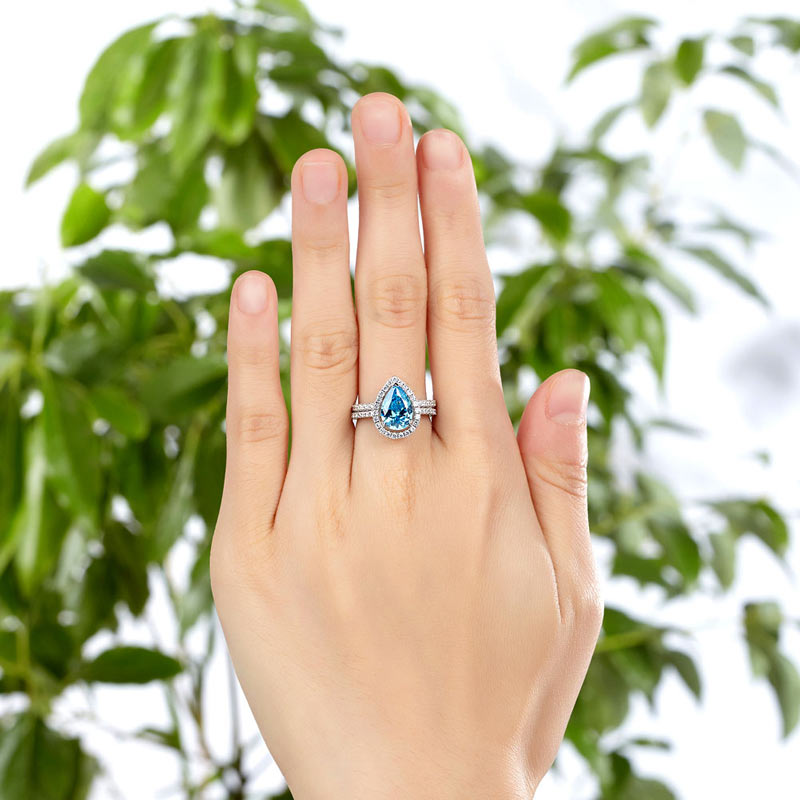2 CT. Pear Cut Aqua Blue Simulated Diamond Halo Bridal Set in Sterling Silver