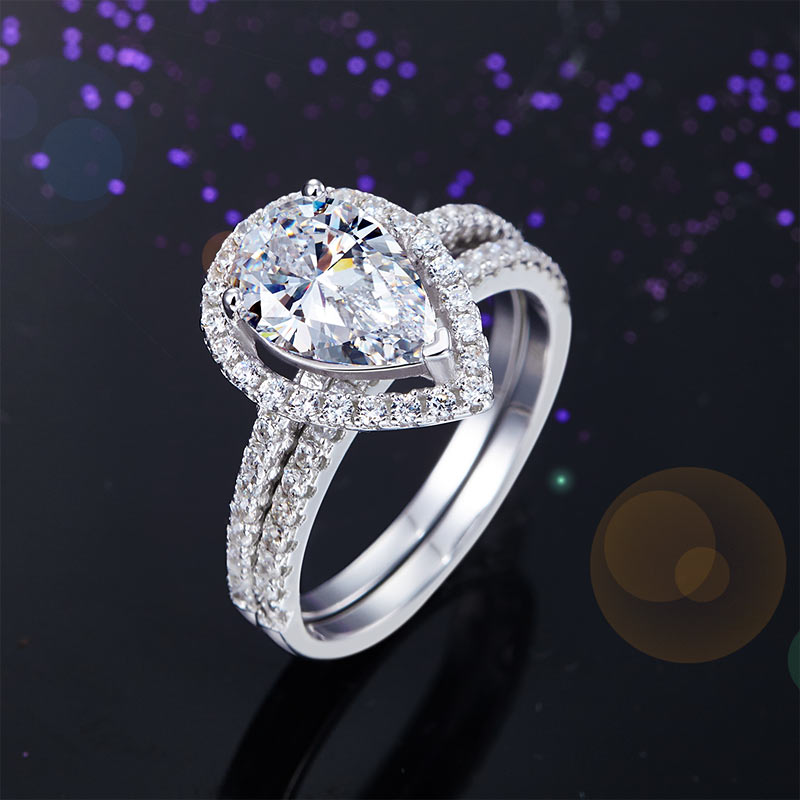 2 CT. Pear Cut Simulated Diamond Halo Bridal Set in Sterling Silver