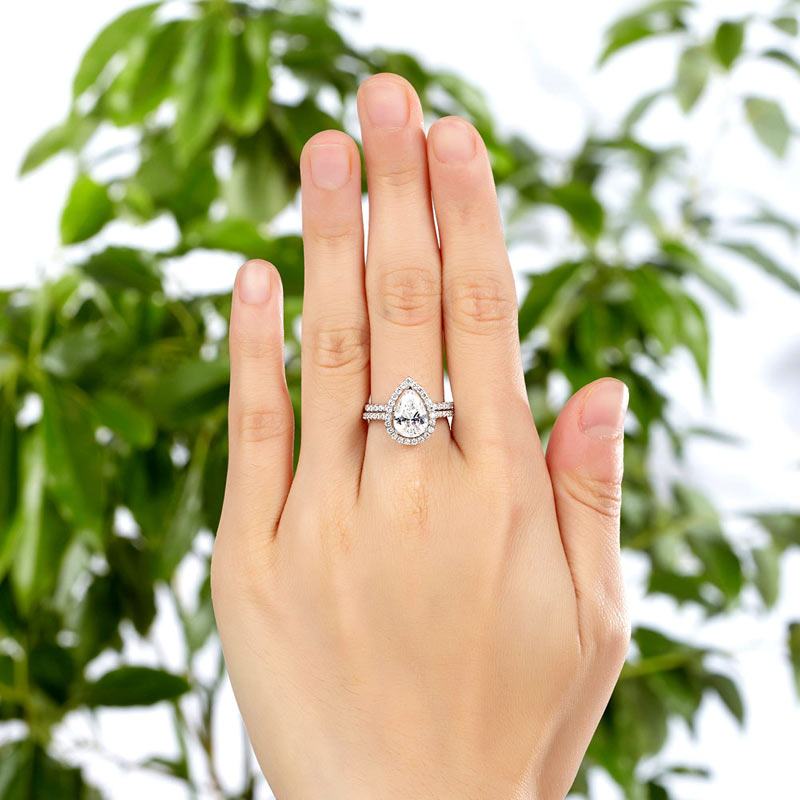 2 CT. Pear Cut Simulated Diamond Halo Bridal Set in Sterling Silver