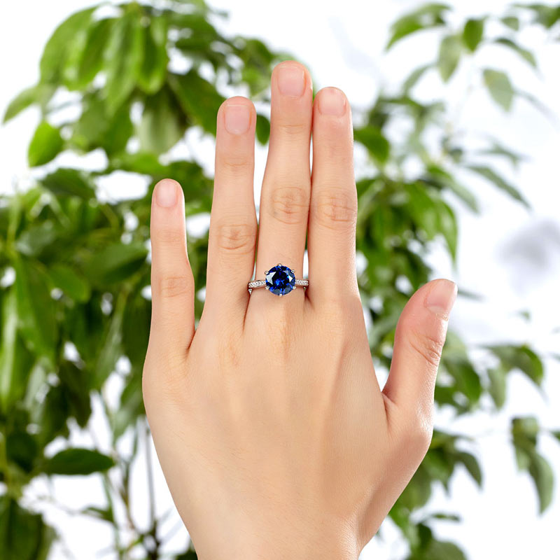 Anillo de tanzanita azul de talla brillante redonda de 3 quilates en plata de ley.