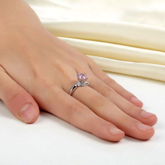 1.25 CT. Round Brilliant Cut Pink Simulated Diamond Halo Ring in Sterling Silver