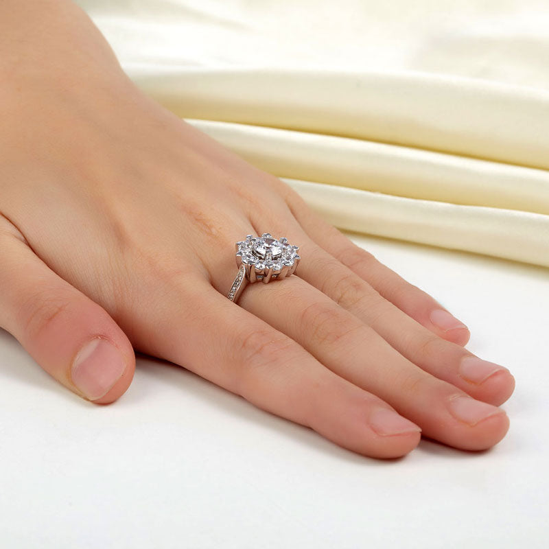 1 CT. Round Brilliant Cut Simulated Diamond Snowflake Halo Ring in Sterling Silver