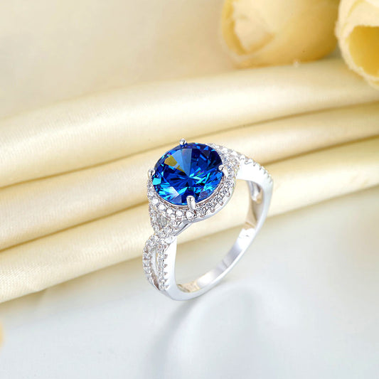 3 CT. Round Brilliant Cut Blue Simulated Diamond Twist Shank Ring in Sterling Silver