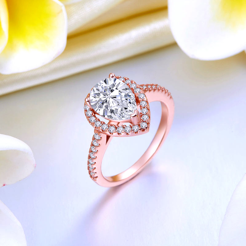 2 CT. Pear Cut Simulated Diamond Halo Ring in Rose Gold Plated Sterling Silver