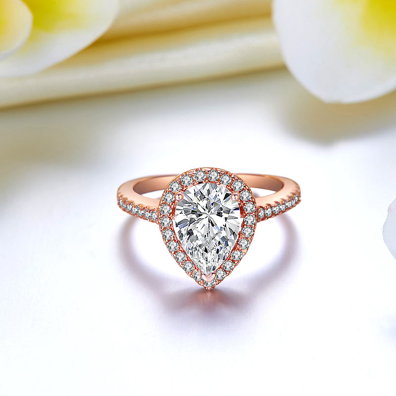 2 CT. Pear Cut Simulated Diamond Halo Ring in Rose Gold Plated Sterling Silver