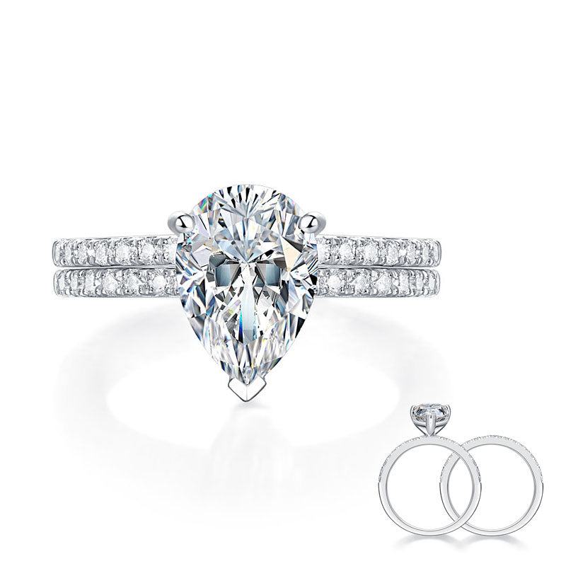 Conjunto nupcial de moissanita de 2 quilates con corte de pera y diamantes en plata de ley.