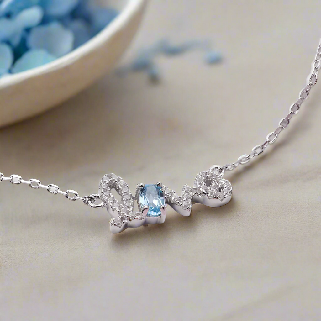 Pulsera ajustable con piedras preciosas "Love" en cursiva GRACE en plata de ley